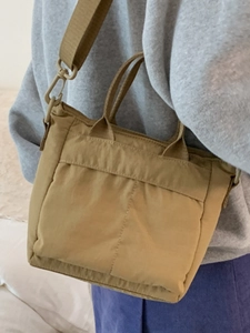 Khaki large capacity nylon tote bag with adjustable shoulder strap for casual wear