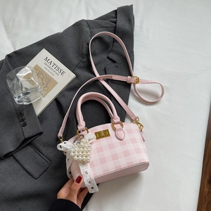Pink and white checkered handbag with pearl heart charm and golden square twist lock detail