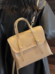 Vintage large capacity light brown tote bag for women showing crossbody wear style