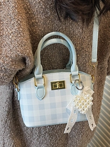 Blue and white checkered mini handbag with pearl heart charm and golden hardware detail