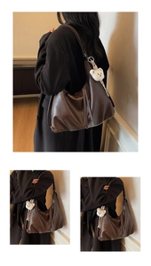 Detail view of large dark brown PU leather tote bag with cute white bear plush charm