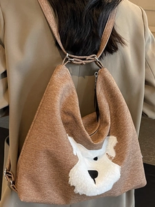 Brown textured fabric shoulder bag featuring a white plush schnauzer dog design for women