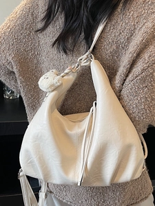 Minimalist creamy white soft PU leather tote bag with woven strap and bear pendant