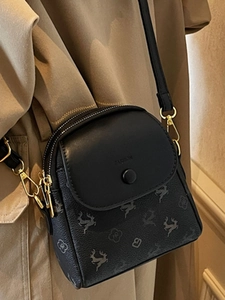 Sac à bandoulière chic en cuir noir avec motifs de rennes et logo fashion gaufré