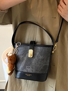 Chic grey marble and black leather bucket bag with a cute bear charm for women