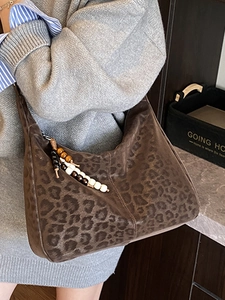 Brown leopard print suede tote bag for women with ethnic beaded charm accessory