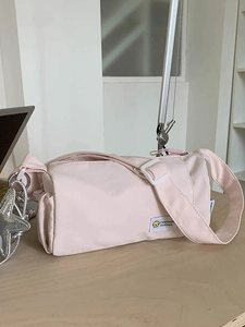 Waterproof light pink crossbody bag with star charm for daily commute and casual style