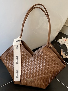 Brown woven tote bag with V-shaped opening and vintage shoulder straps for women