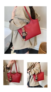 Red leather tote bag with rabbit charm shown in multiple angles and lifestyle scenes