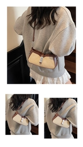 Detailed view of beige canvas saddle bag with brown leather trim and quilted diamond pattern