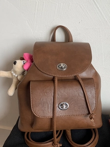 Vintage brown PU leather backpack with large capacity and silver twist locks