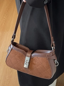 Vintage dark brown suede shoulder bag with diamond stitching and silver buckle