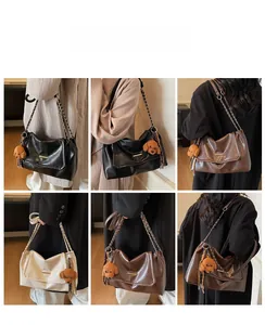 Detail showing classic color options for the chain shoulder bag with cute plush pendant