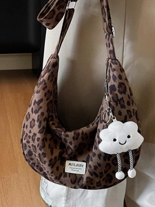 Retro leopard print hobo tote bag for women with cute plush cloud charm accessory