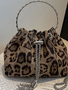 Fashionable leopard print drawstring bucket bag with large silver metal ring handle