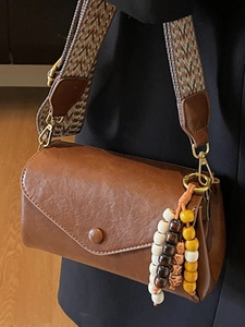 Brown retro small square crossbody bag with jacquard strap and colorful bead charm