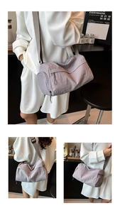 Detailed view of light purple nylon tote bag with crinkle texture and adjustable strap