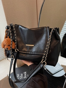 Retro black faux leather tote bag with gold chain strap and teddy bear charm for women