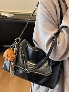 Retro black oversized hobo bag with metal chain strap and cute puppy charm accessory