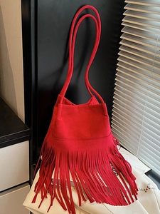 Chic red faux suede fringe shoulder bag with bohemian long tassels and dual slim straps
