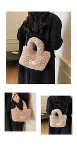 Detail of plush beige faux shearling bag with silver chain and quote woven label