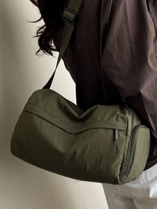 Olive green nylon tote bag with adjustable shoulder strap for casual fitness commute