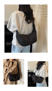Detail view showing black nylon crescent crossbody bag worn by model at different angles
