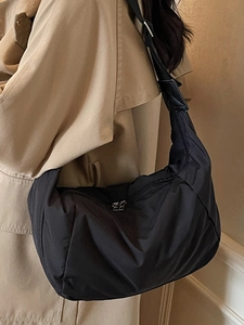 Chic black nylon crescent crossbody bag for women with adjustable strap for daily commute