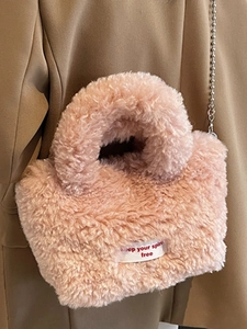 Pink plush teddy fleece handbag with metal chain strap and inspirational label