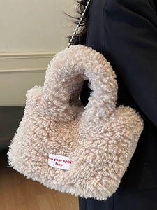 Chic off-white faux fur plush tote bag with Keep your spirits free slogan for women