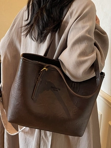 Brown faux leather tote bag with New York print for office commute and daily style