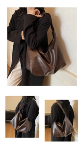 Detail view of large dark brown oil wax leather shoulder bag with adjustable strap