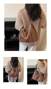 Three-way carry view of brown large capacity shoulder bag showing zipper details