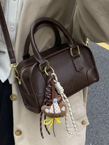 Retro dark brown crossbody Boston bag with adjustable strap and bear charm accessory