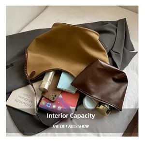 Interior view of large canvas tote bag showing storage space for tablet and makeup