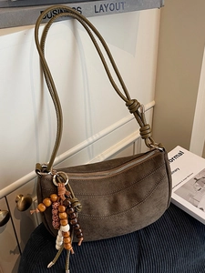 Chic dark brown faux suede croissant shoulder bag with ethnic wooden beads and knot strap