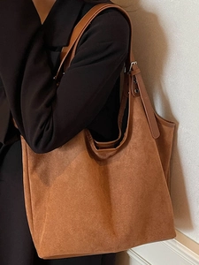 Vintage brown suede tote bag for women with adjustable strap for stylish commuting