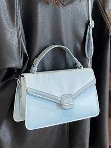 Elegant light blue commuter crossbody bag with high-quality leather texture and V-stitch detail