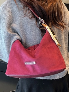 Minimalist burgundy suede hobo tote bag with fashion tag and colorful wooden beads