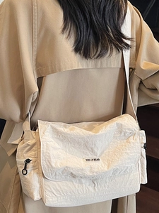 Japanese minimalist cream tote bag with adjustable shoulder strap and nylon fabric