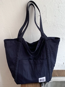Large capacity navy blue nylon tote bag with functional front pocket for daily commute