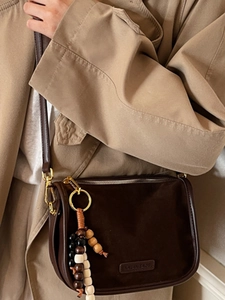 Fashionable leopard print style brown crossbody bag with wooden beads for daily use