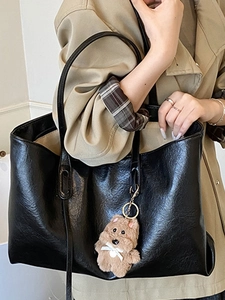 Chic black faux leather large tote bag with teddy bear pendant for commuting women