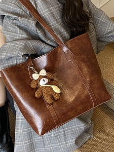 Chic large brown faux leather tote bag with teddy charm for women's daily commute