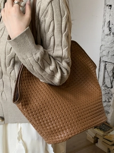 Caramel woven leather bucket bag for women with large capacity and shoulder strap