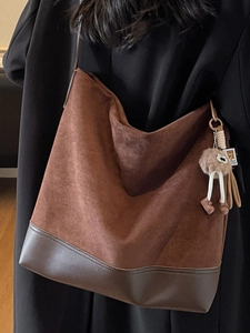 Vintage brown suede hobo bag with large capacity and plush charm for women