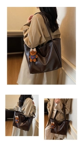 Close-up of large dark brown tote bag in oil-wax faux leather with cute bear charm