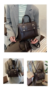 Detail of dark brown leather texture with golden buckle on a vintage multifunctional bag