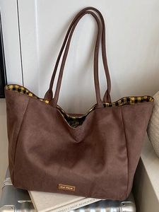 Brown leopard print canvas tote bag with large capacity and minimalist design for commuting