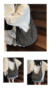 Detail showing the black and white checkered pattern on a large canvas crescent bag